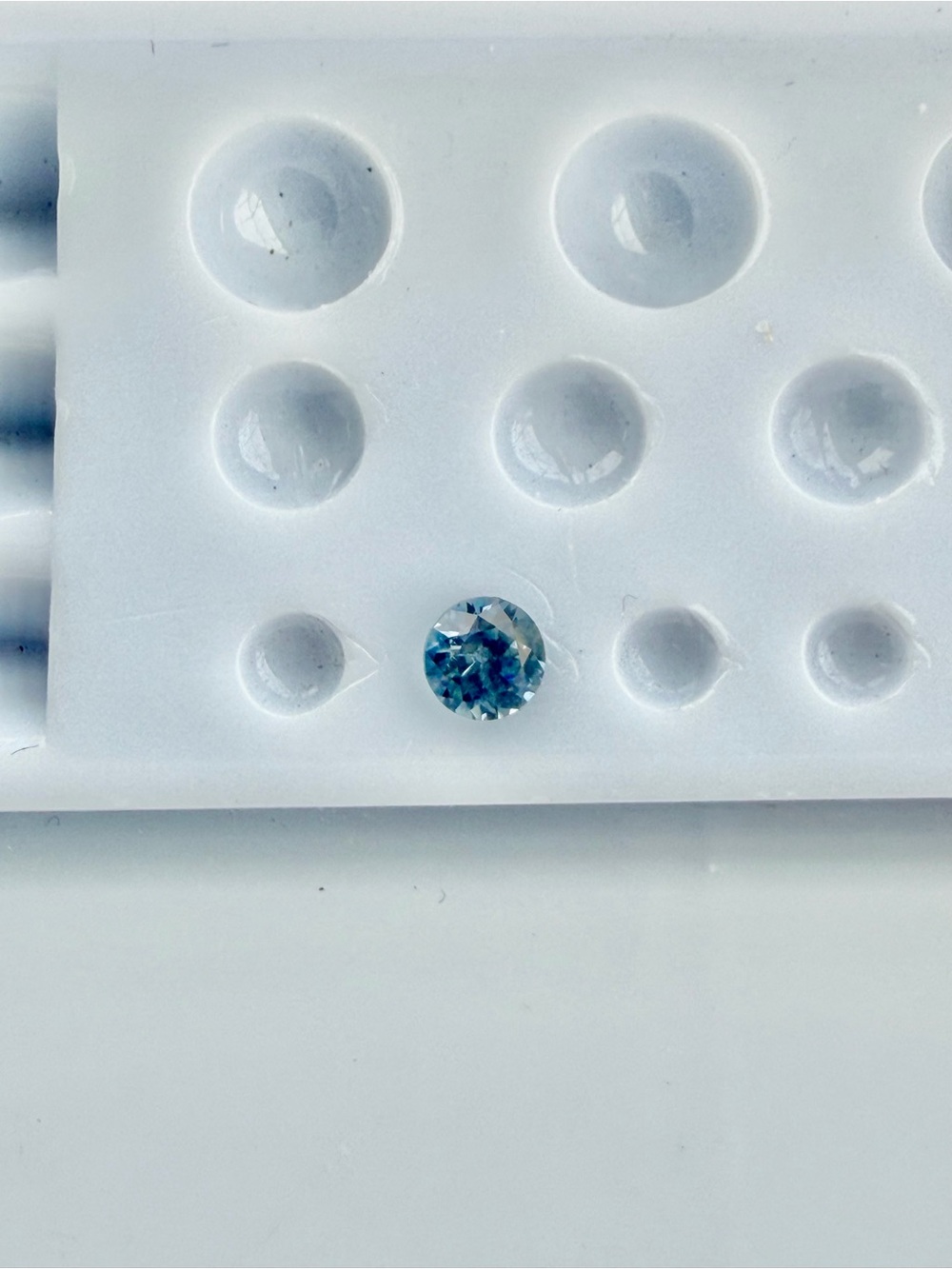 Round Blue Faceted Sapphire .24 carats